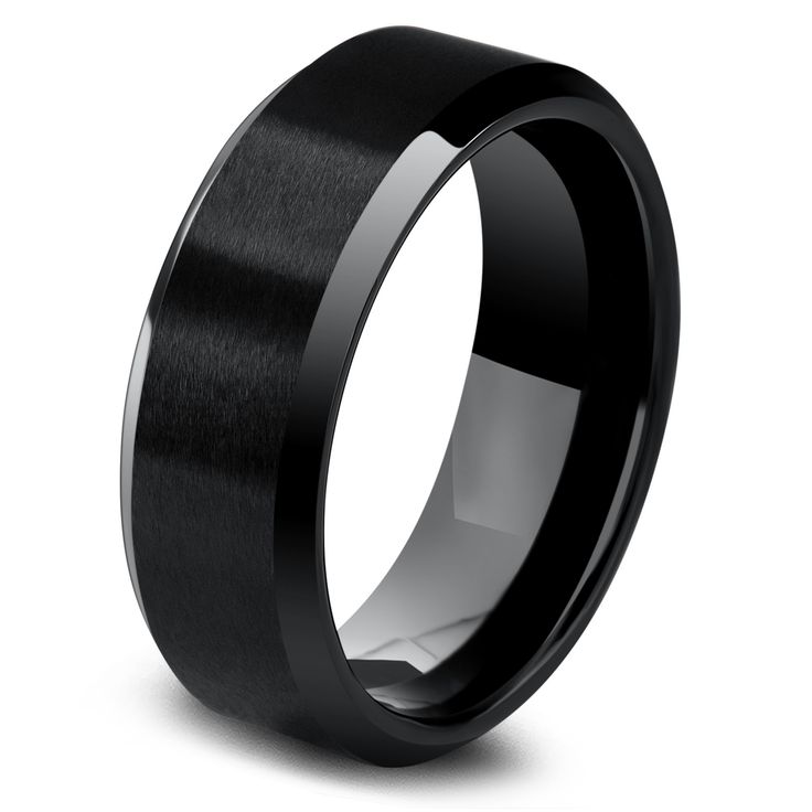 black ceramic wedding band with brushed finish and polished center, on an isolated white background