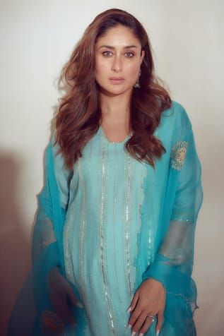 Turquoise blue chanderi kurta with zari and sequins detailing and sleeves are highlighted with sequins and embroidered organza details. Paired with shantoon palazzo with zari lace details and embroidered scallop organza dupatta.
Component: 3
Pattern: Embroidered
Type Of Work: Zari Work
Neckline: Blunt V Neck
Sleeve Type: Long Sleeves
Fabric: Zari Chanderi, shantoon and organza
Color: Blue
Other Details: 
Zari work
Cutwork dupatta
Occasion: Puja - Aza Fashions Kurta Palazzo Set, Kurta Set For Women, A Line Kurta, Palazzo Set, Organza Dupatta, Embroidered Neckline, Kurta With Pants, Purple Silk, Alia Bhatt