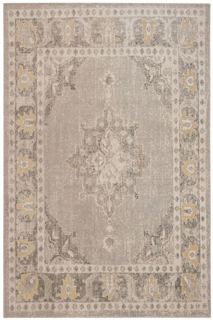 an area rug with grey and yellow accents