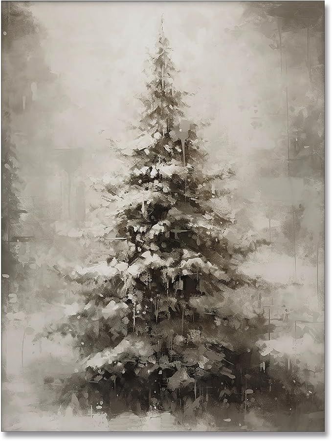 a black and white photo of a snow covered christmas tree