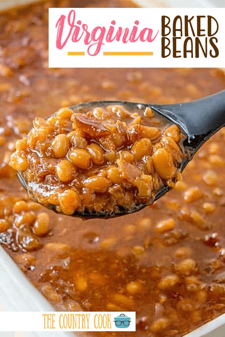 a spoon full of baked beans in a casserole dish