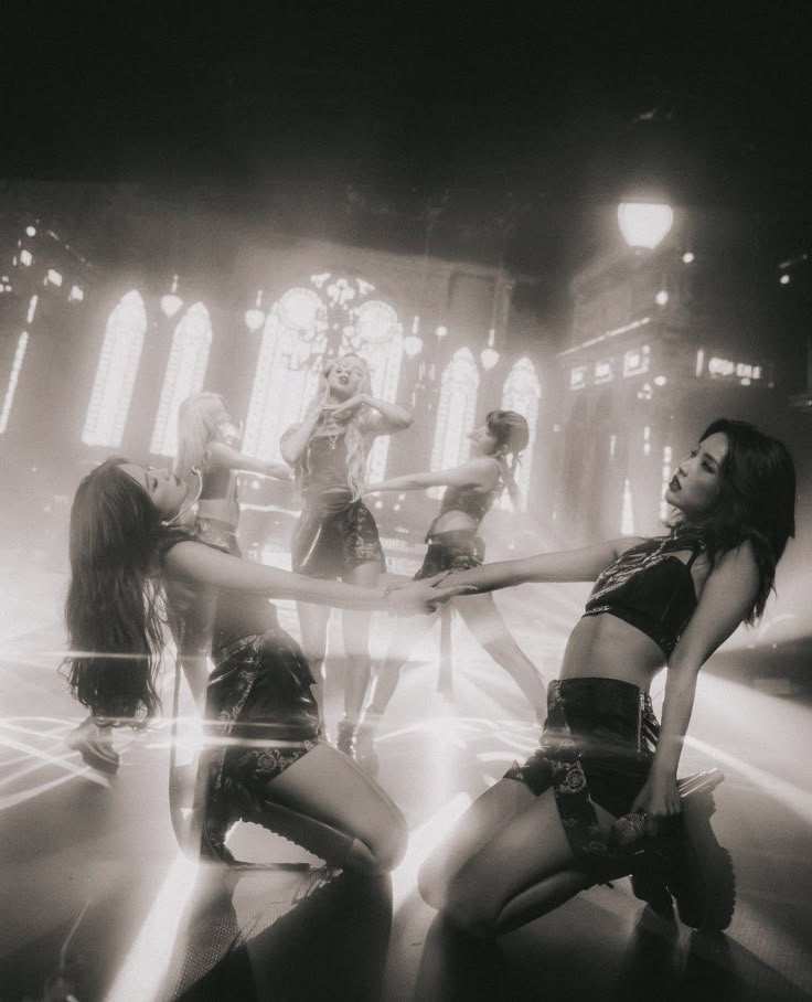 a group of young women dancing on stage