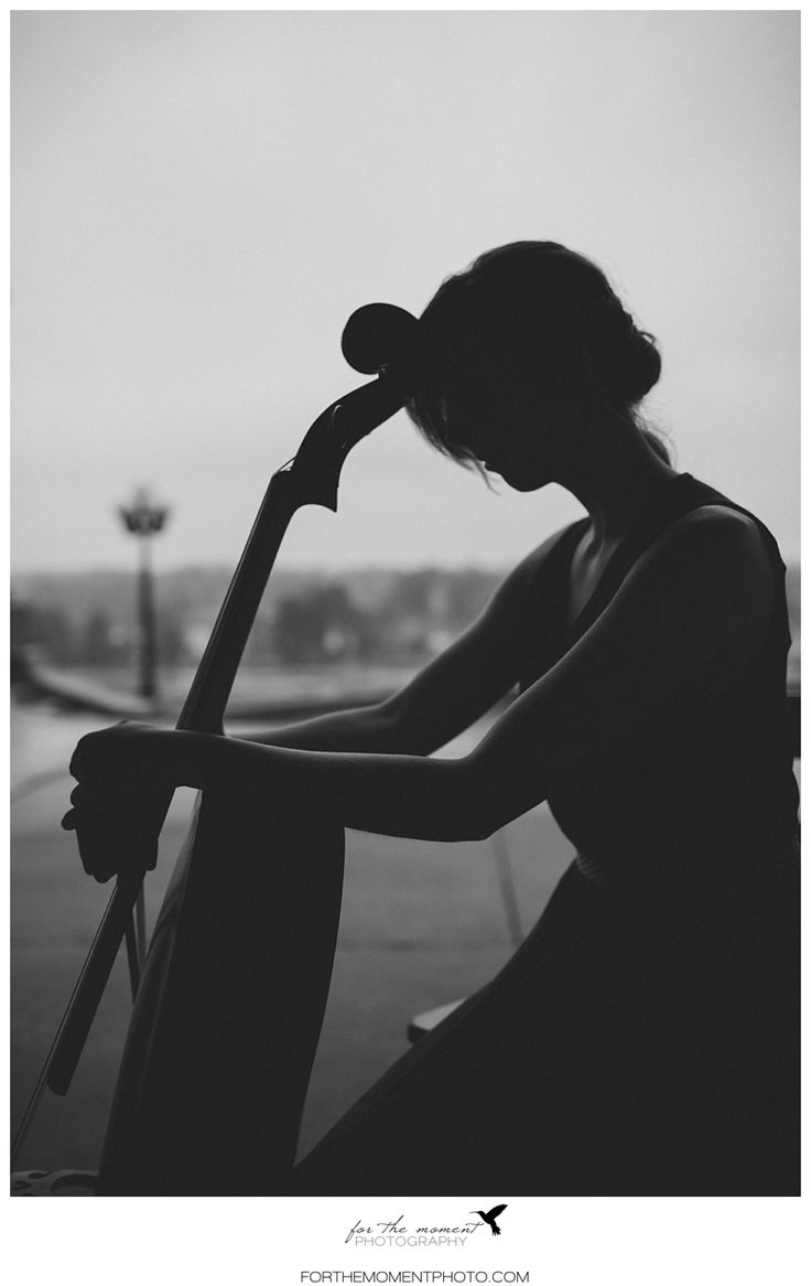 a woman sitting in the passenger seat of a car