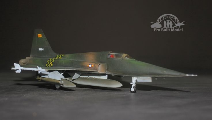 a model fighter jet sitting on top of a table