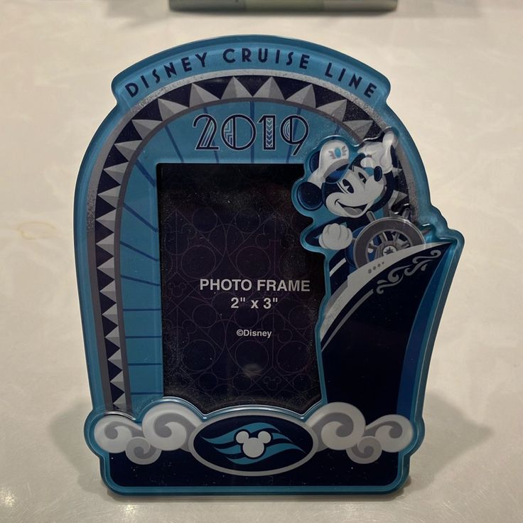 a disney cruise line photo frame with mickey mouse on it's front and side