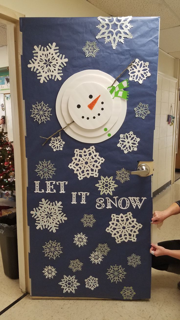 a door decorated to look like a snowman