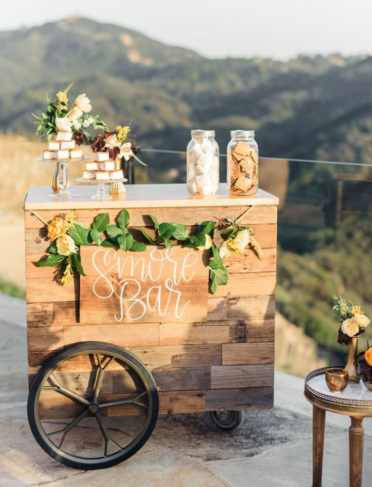 a wooden cart with some flowers on it