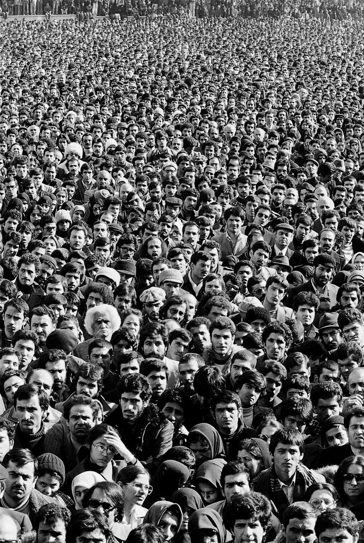 a large group of people are standing together