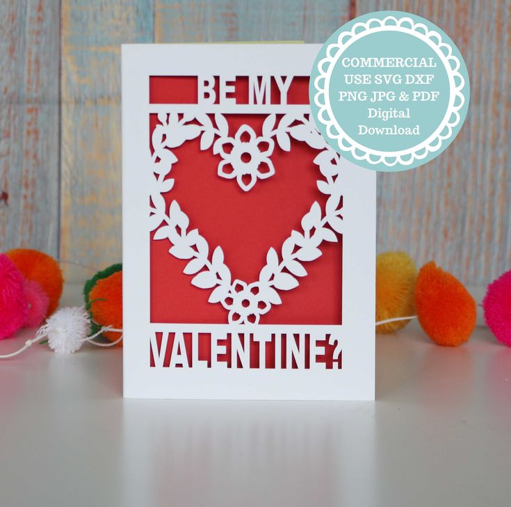 a valentine's day card with the words be my valentine on it and a heart cut out of paper