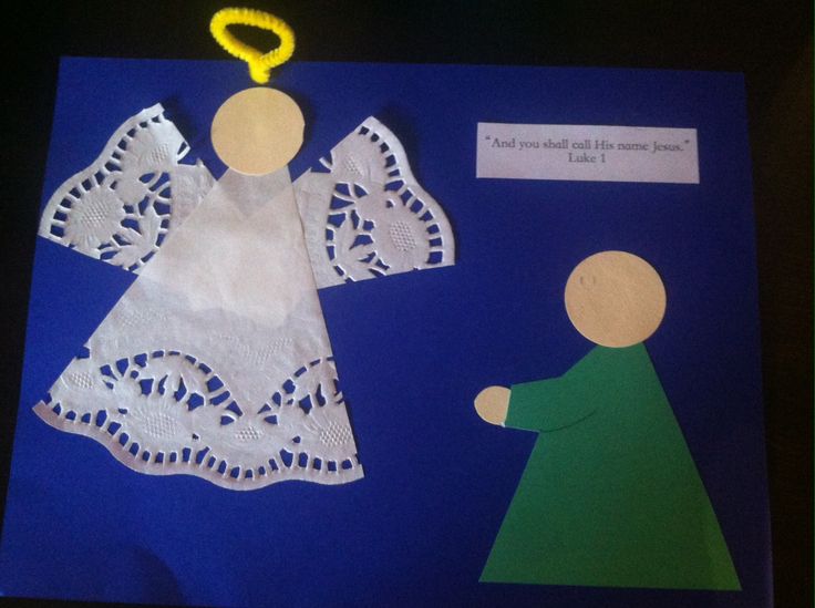 paper cut out of an angel and a person