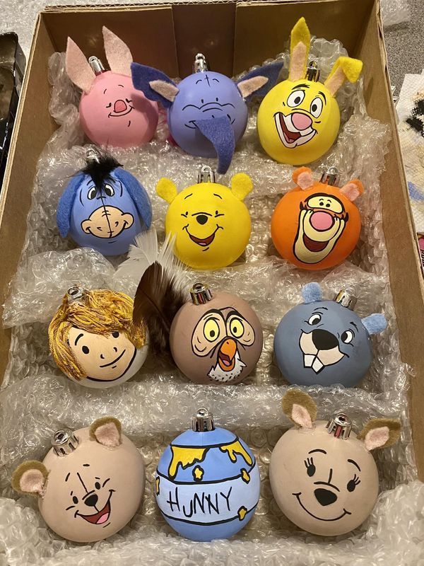 a box filled with lots of cartoon ornaments