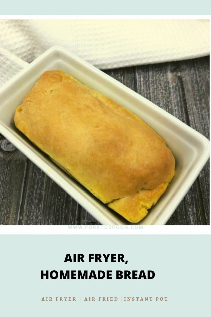 an air fryer homemade bread in a white tray