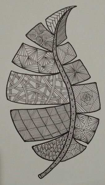 a drawing of a leaf with an intricate design on it