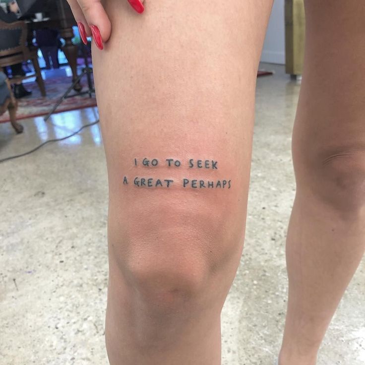 a woman's leg with writing on it that says, i go to see a great perhaps