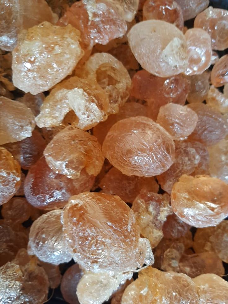 some brown and white crystals are in a bowl