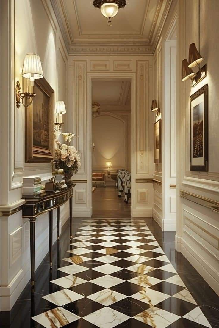 an elegant hallway with black and white checkered flooring