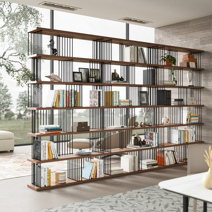 a living room filled with lots of furniture and bookshelves next to a window