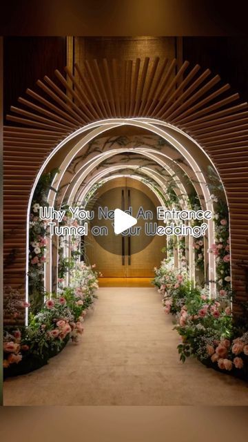 the entrance to an event with flowers and greenery on either side, and text that reads when you're not an employee turned on or we deliver