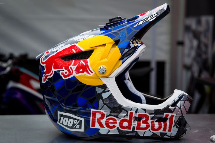 a red bull helmet sitting on top of a table