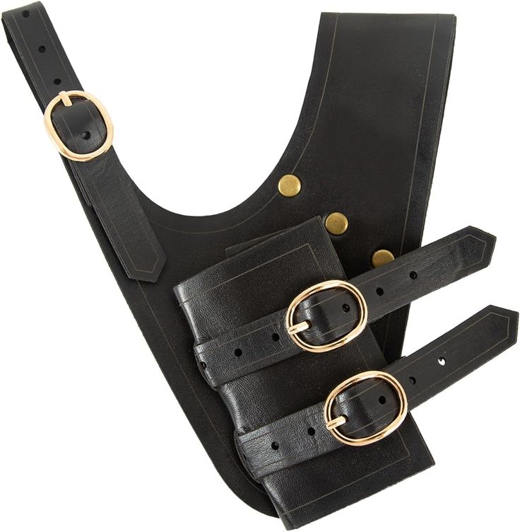 a black leather harness with two gold rings