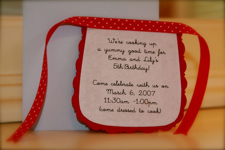 a red and white birthday card with a polka dot ribbon tied around the back of it