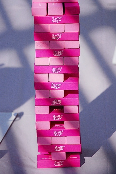 a stack of pink cubes sitting on top of a table