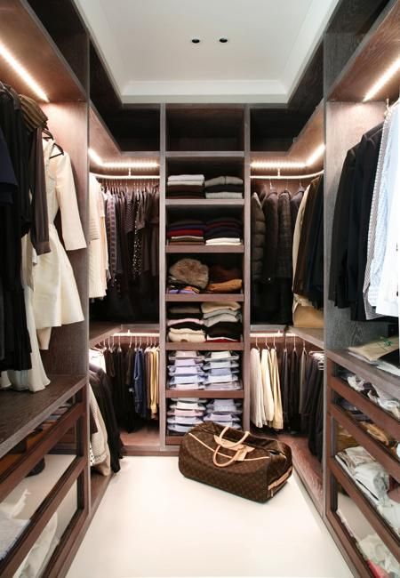 the closet is full of clothes and other things to buy for someone's wardrobe