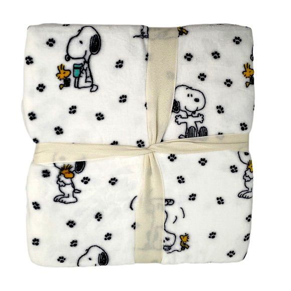 two blankets with snoopy dogs on them, one is white and the other is black