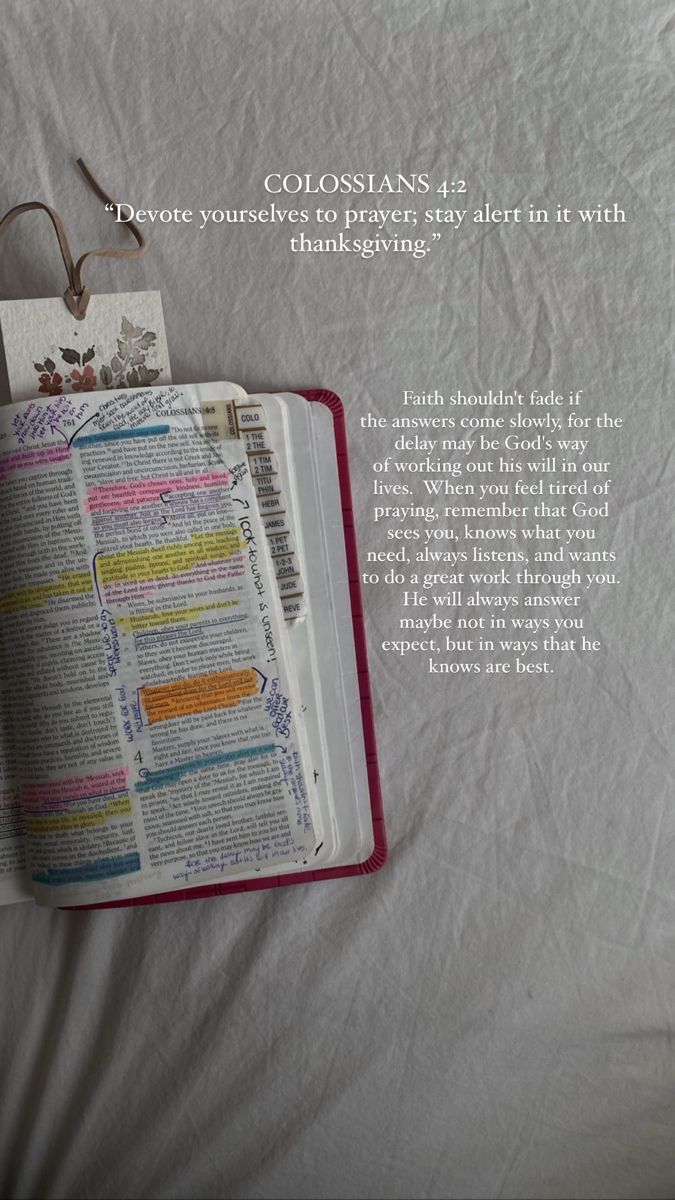 an open bible laying on top of a bed with the words colossians above it