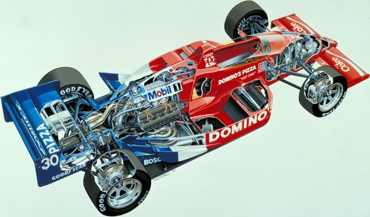 an image of a red race car with the engine