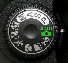 an auto wheel cover with the words usa and green on it's center hub