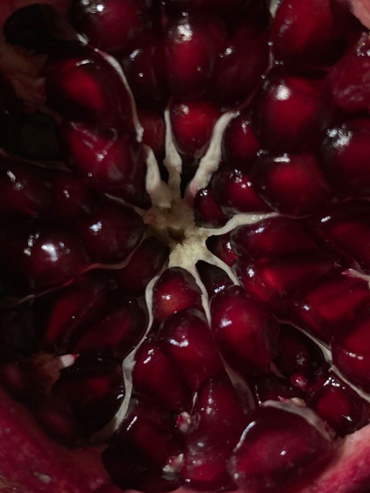 the inside of a pomegranate that has been cut in half