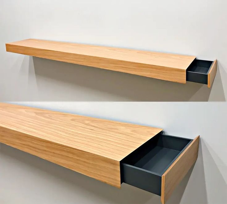 two wooden shelves on the wall, one with an open drawer and another with a closed shelf