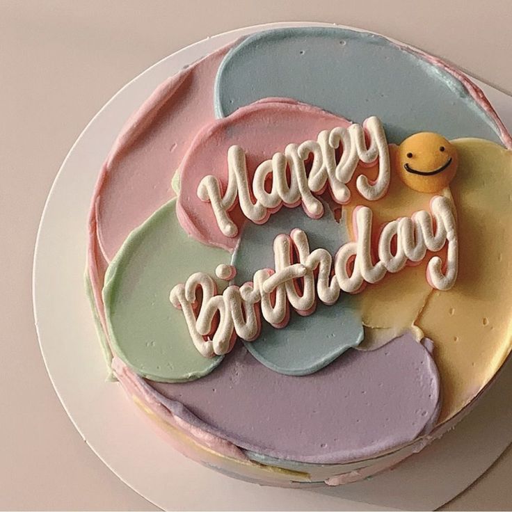 a birthday cake with the words happy birthday written on it and an image of a rubber duck