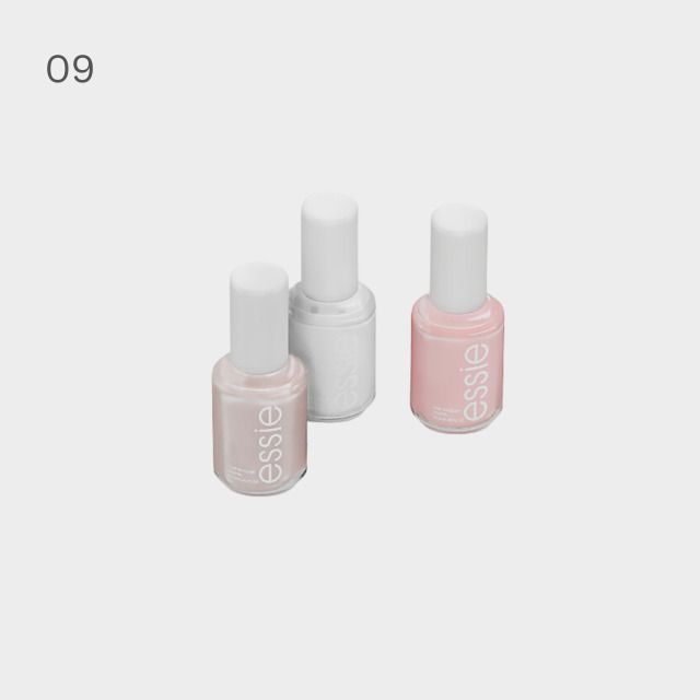 three bottles of nail polish sitting next to each other on a white background with the words essie written in it