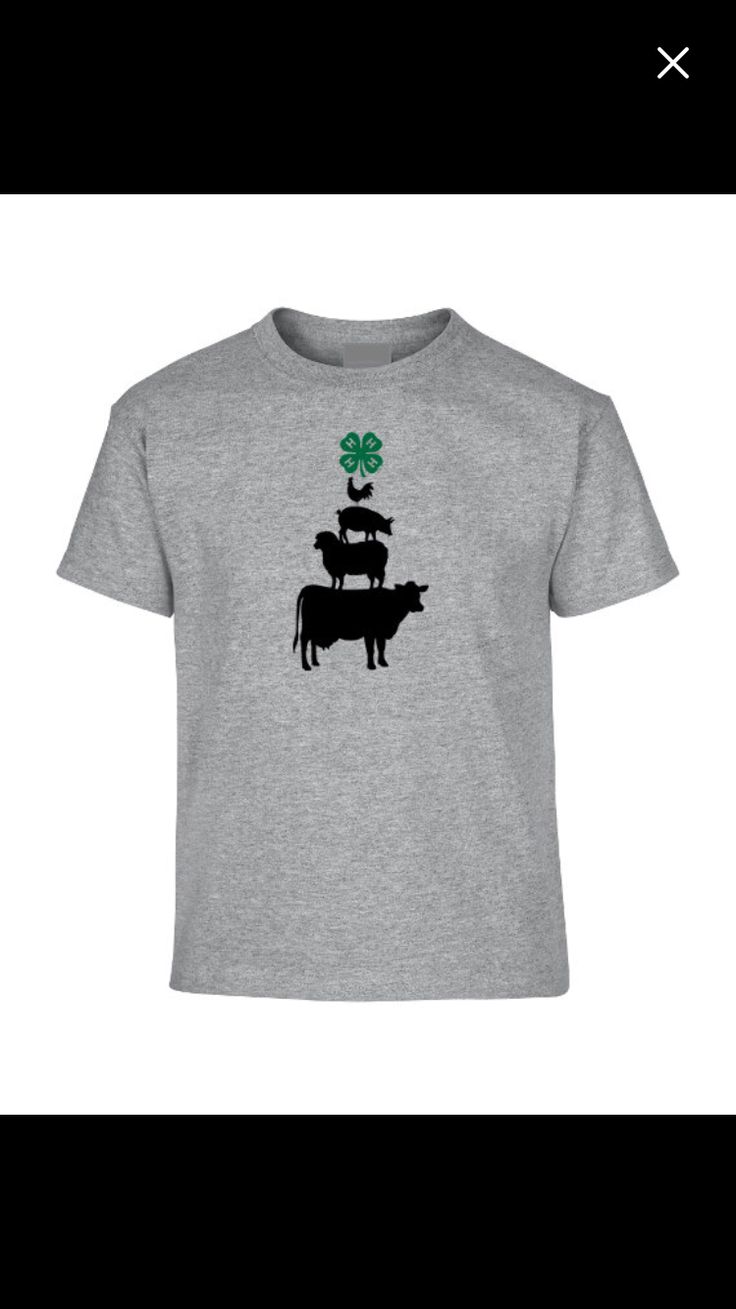 a t - shirt with cows and clovers on it