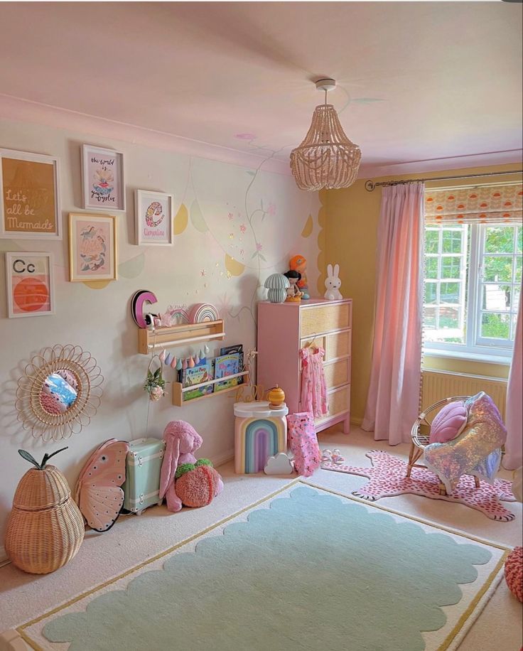 a child's bedroom decorated in pastel colors with toys on the floor and decor