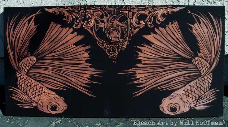 two fish are depicted on a black and brown paper with ornate designs in the background