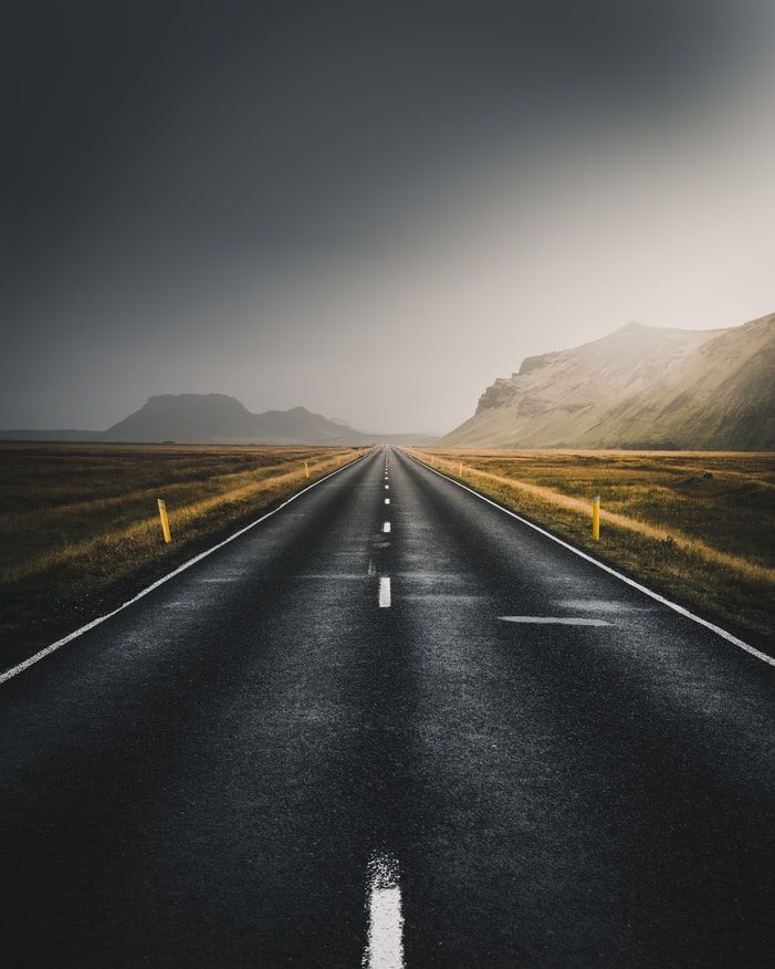 an empty road in the middle of nowhere