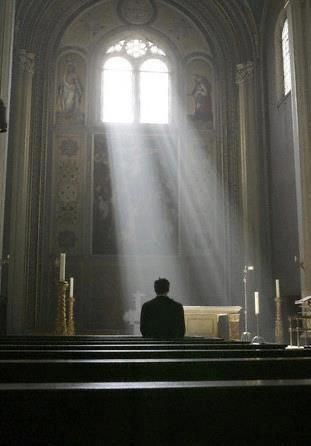 the light shines through the windows in an old church with pews on either side