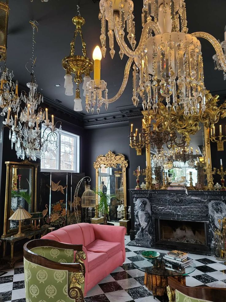 a fancy living room with chandeliers and furniture