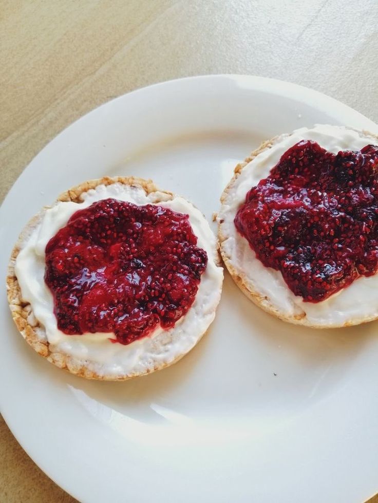 two small pastries on a white plate