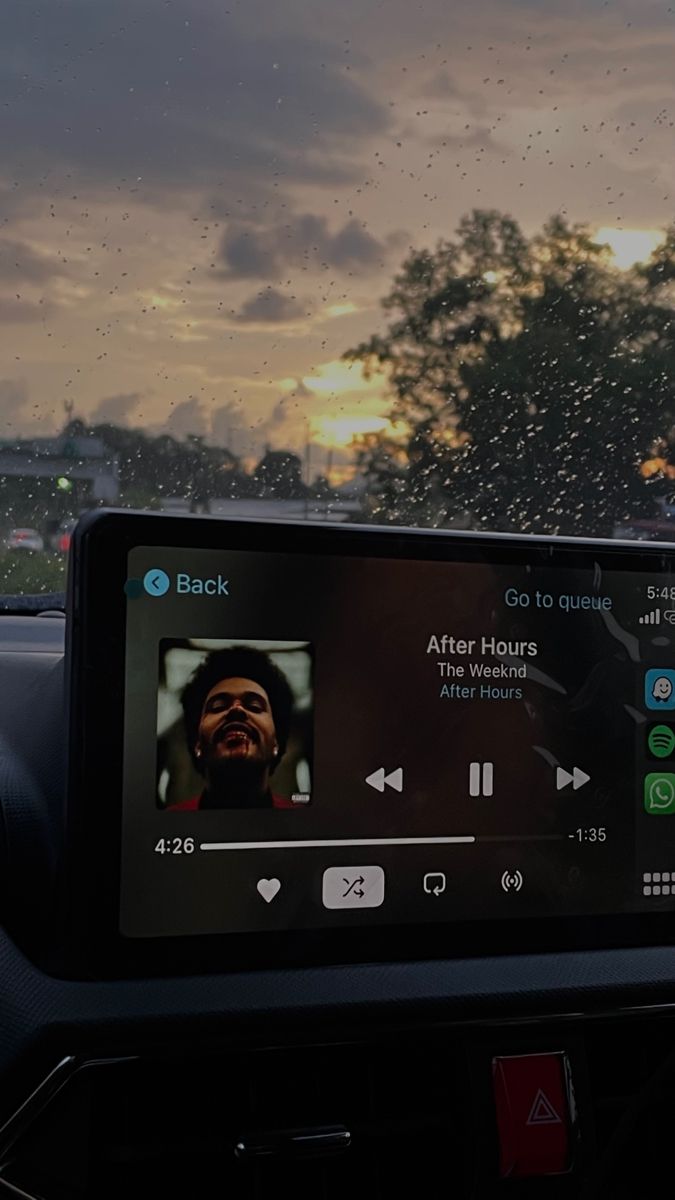 the dashboard of a car with an image of a man's face on it