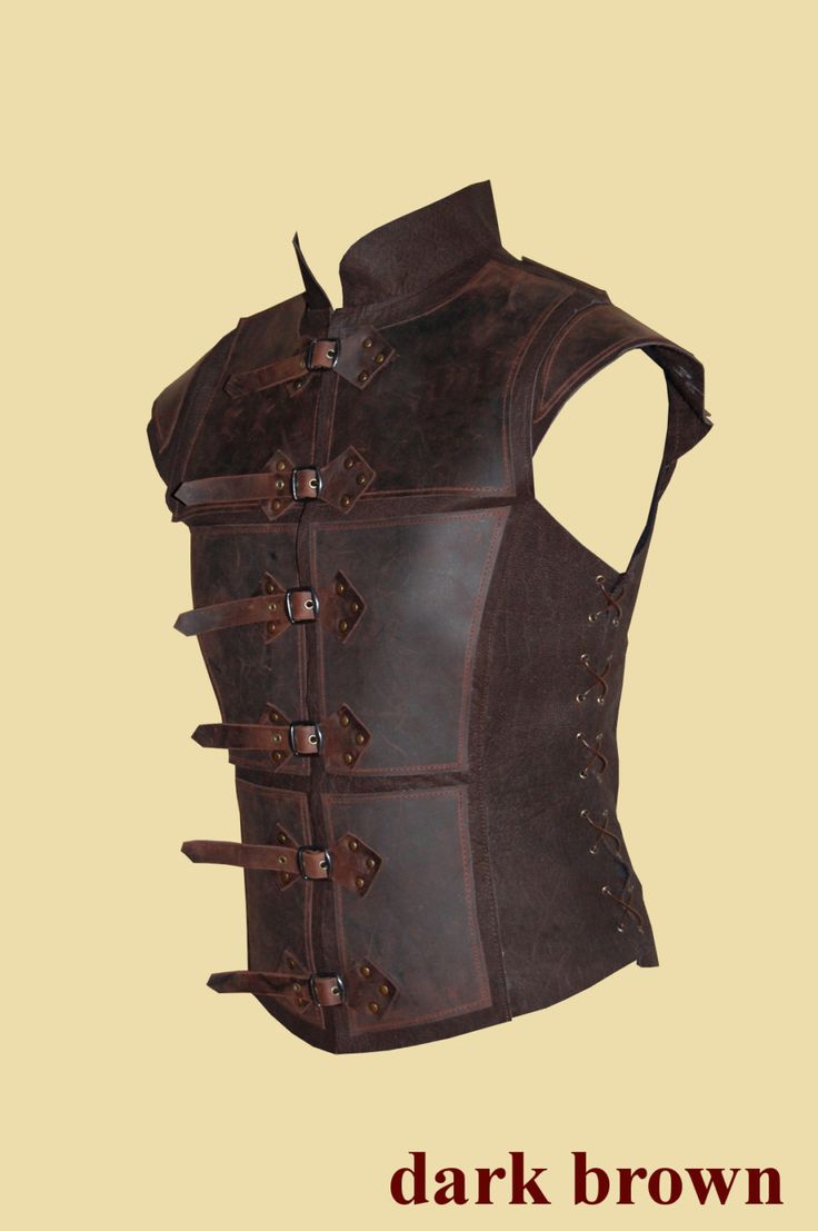 the back of a leather corset with multiple straps and buckles on it