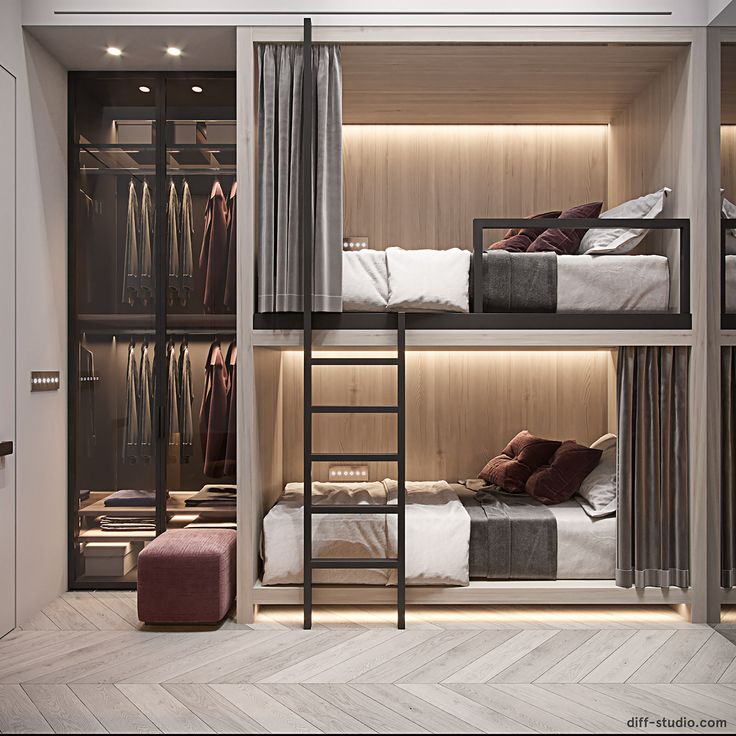 a bedroom with bunk beds and closets in it