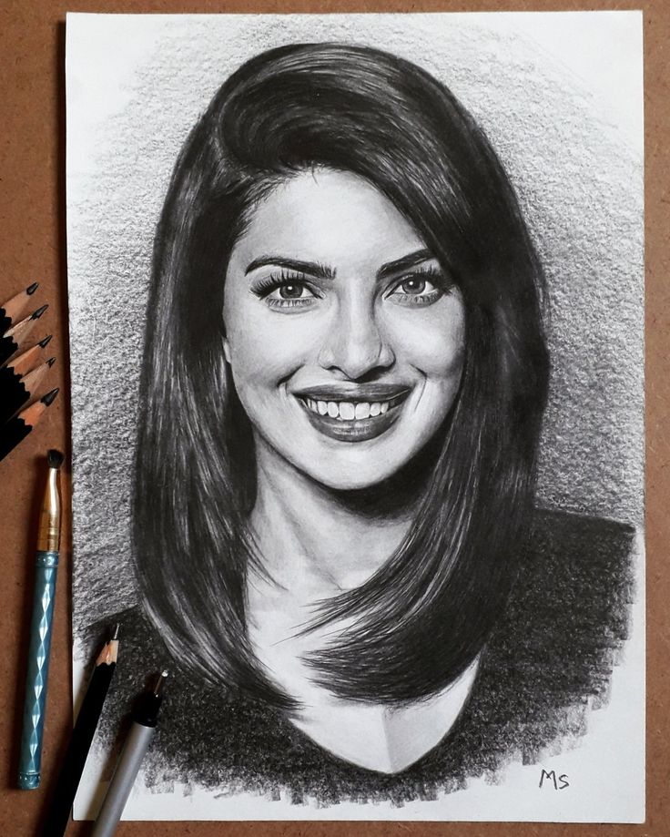 a pencil drawing of a smiling woman