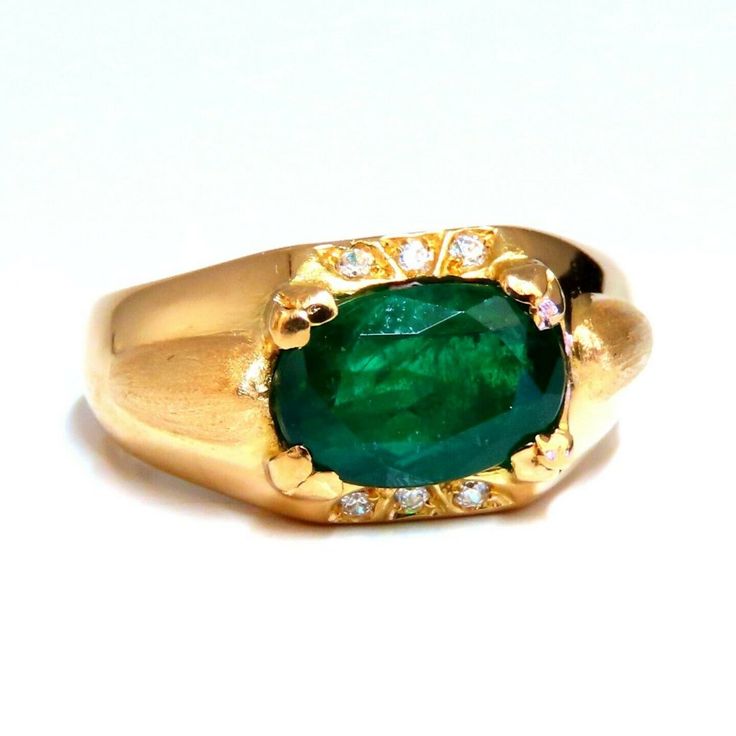 Mens Natural Emerald Ring. 2.80ct. Natural Oval Cut, Emerald Ring Emerald: 10 X 7mm Transparent & Vivid Green .12ct. Diamonds. Round & Full Cuts G-Color Vs-2 Clarity. 16kt. Yellow Gold 6.4 Grams Ring Current Size: 8 Depth Of Ring: 5.3mm Diameter Deck Of Ring: 10mm (Free Resize Service, Please Inquire) $8,000 Appraisal Certificate To Accompany Mens Emerald Rings, Natural Emerald Rings, Diamond Cluster Earrings, Fancy Yellow Diamond, Ruby Diamond Rings, Ring Emerald, Citrine Ring, Mens Ring, Mens Accessories Jewelry