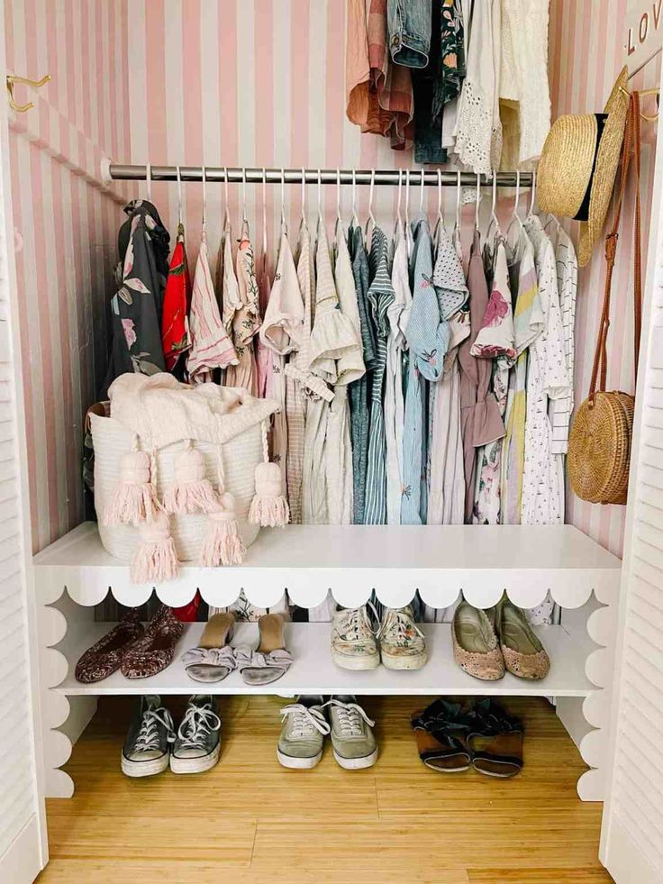 a closet filled with lots of clothes and shoes