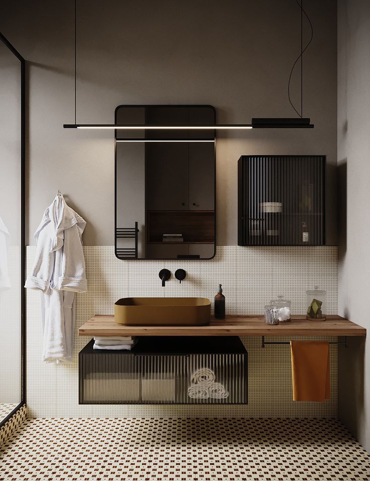 a bathroom with a sink, mirror and towel rack in it's center area