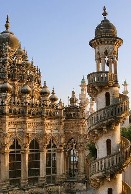 an ornate building with many windows and balconies